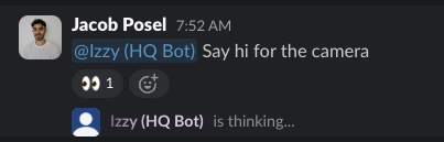 An HQ Agent responding in Slack and visibly working on the request.